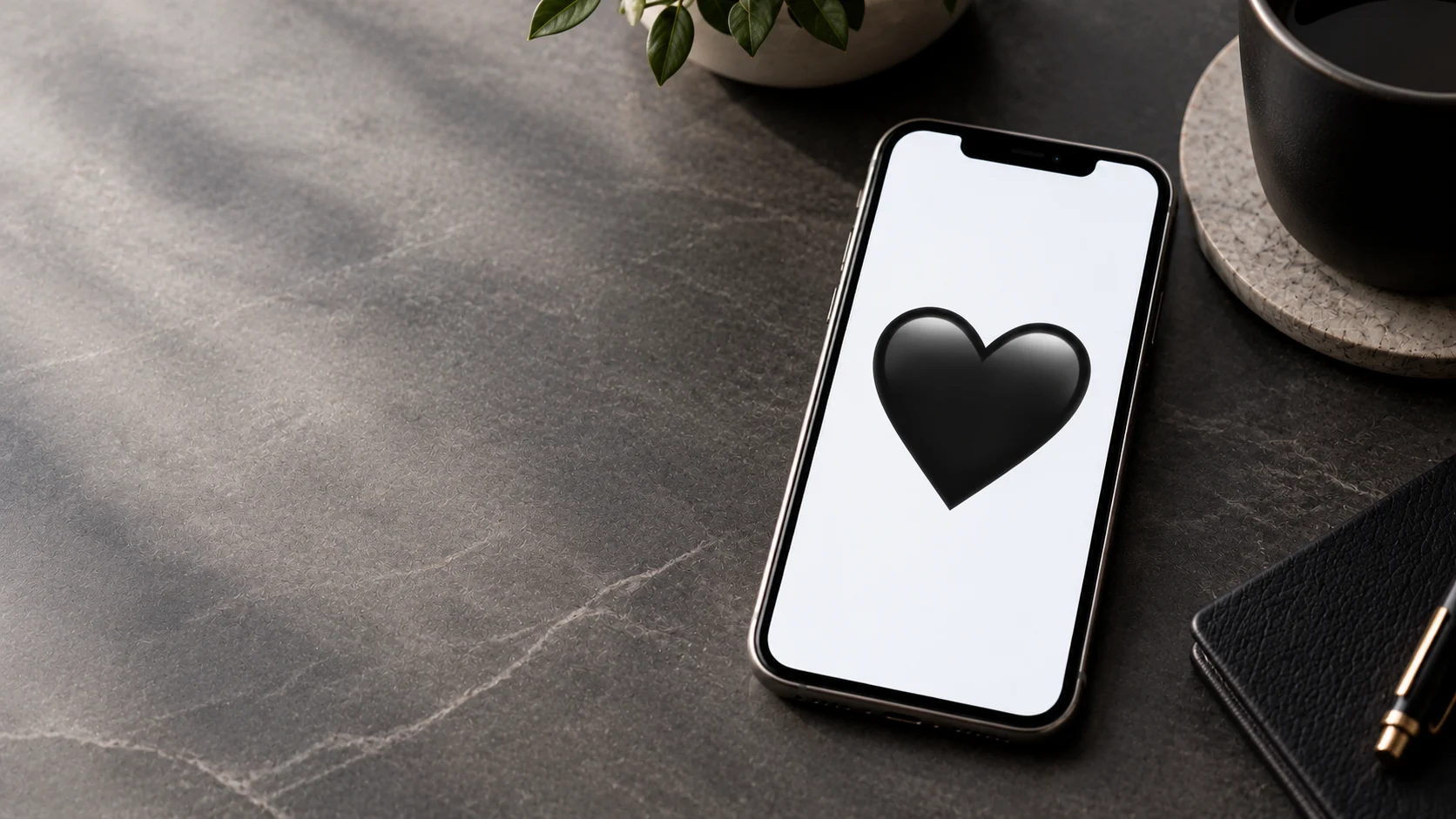 what does a black heart emoji mean